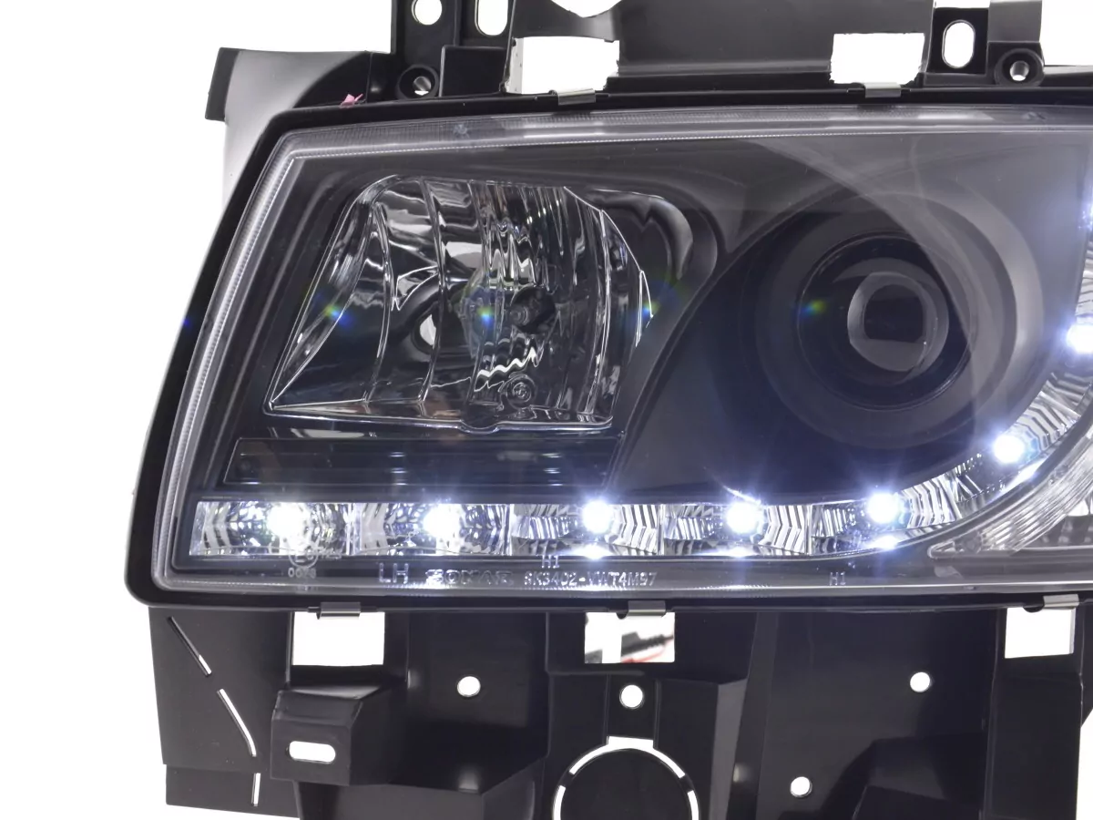Scheinwerfer Set Daylight LED TFL-Optik VW Bus Typ T4 Bj. 96-03 schwarz für Rechtslenker