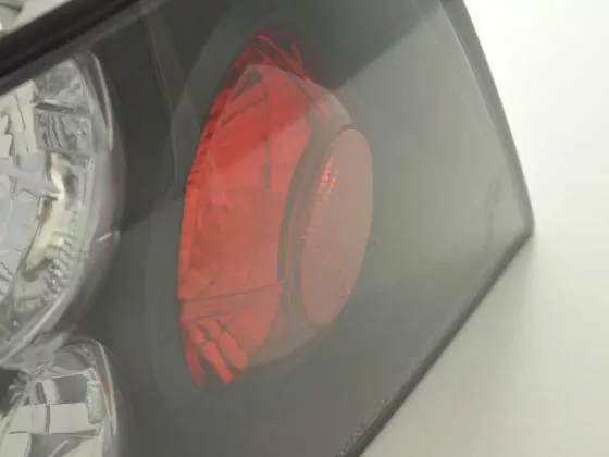 Rückleuchten Set Mitsubishi Mirage Lancer Bj. 01-06 schwarz