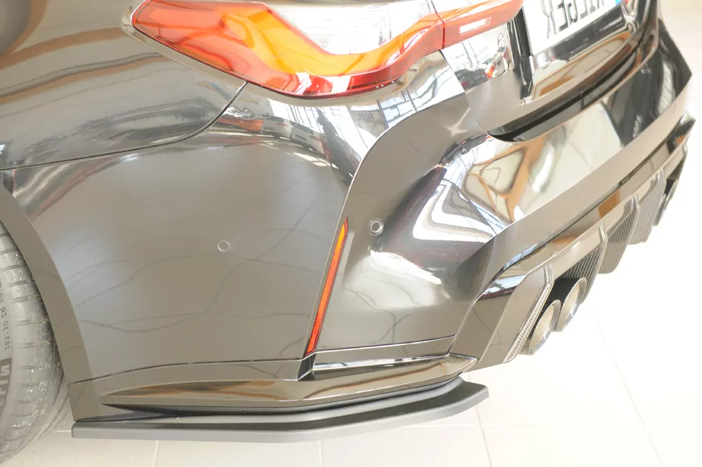 Rieger Heckschürzenansatz seitlich links matt schwarz für BMW 4er G83 M4 (G234M) Cabrio 06.21-