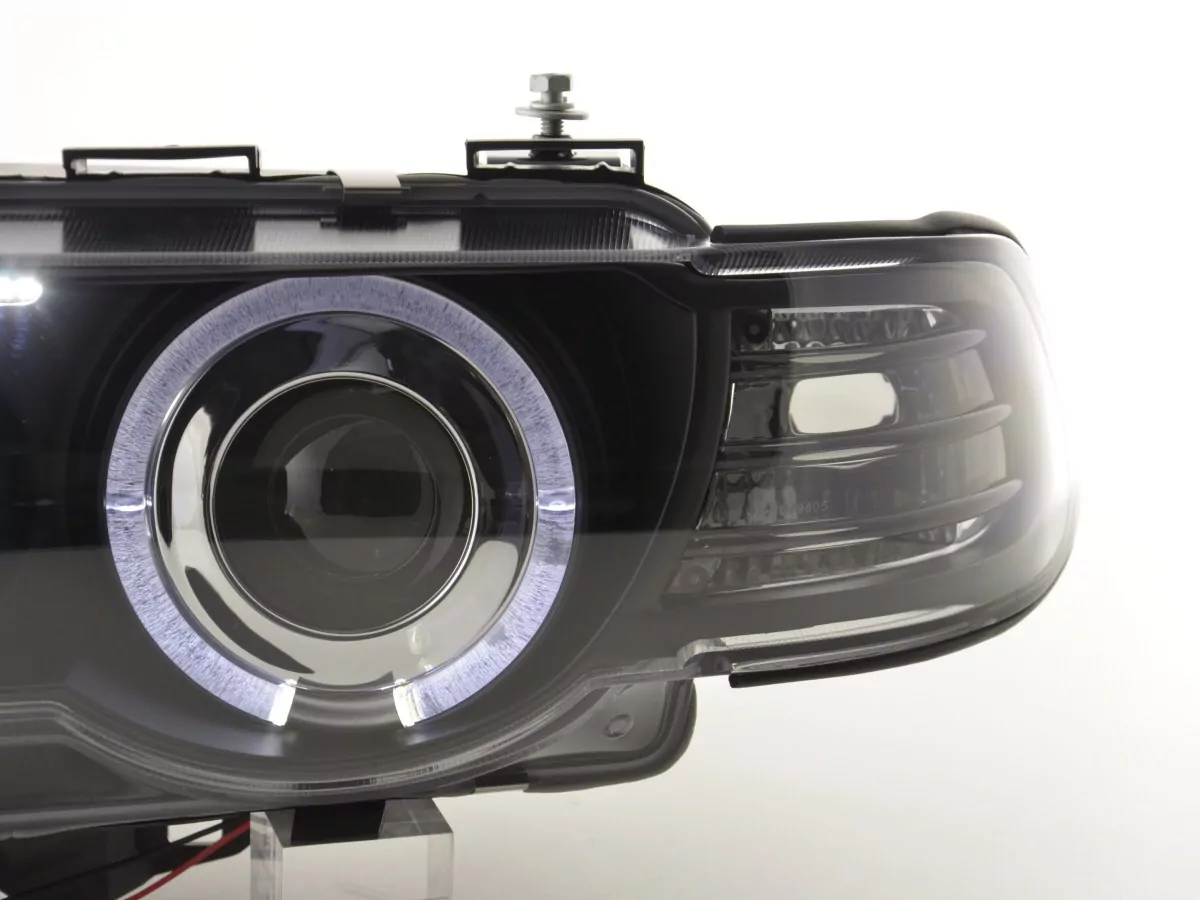 Scheinwerfer BMW 7er Typ E38  99-02 schwarz