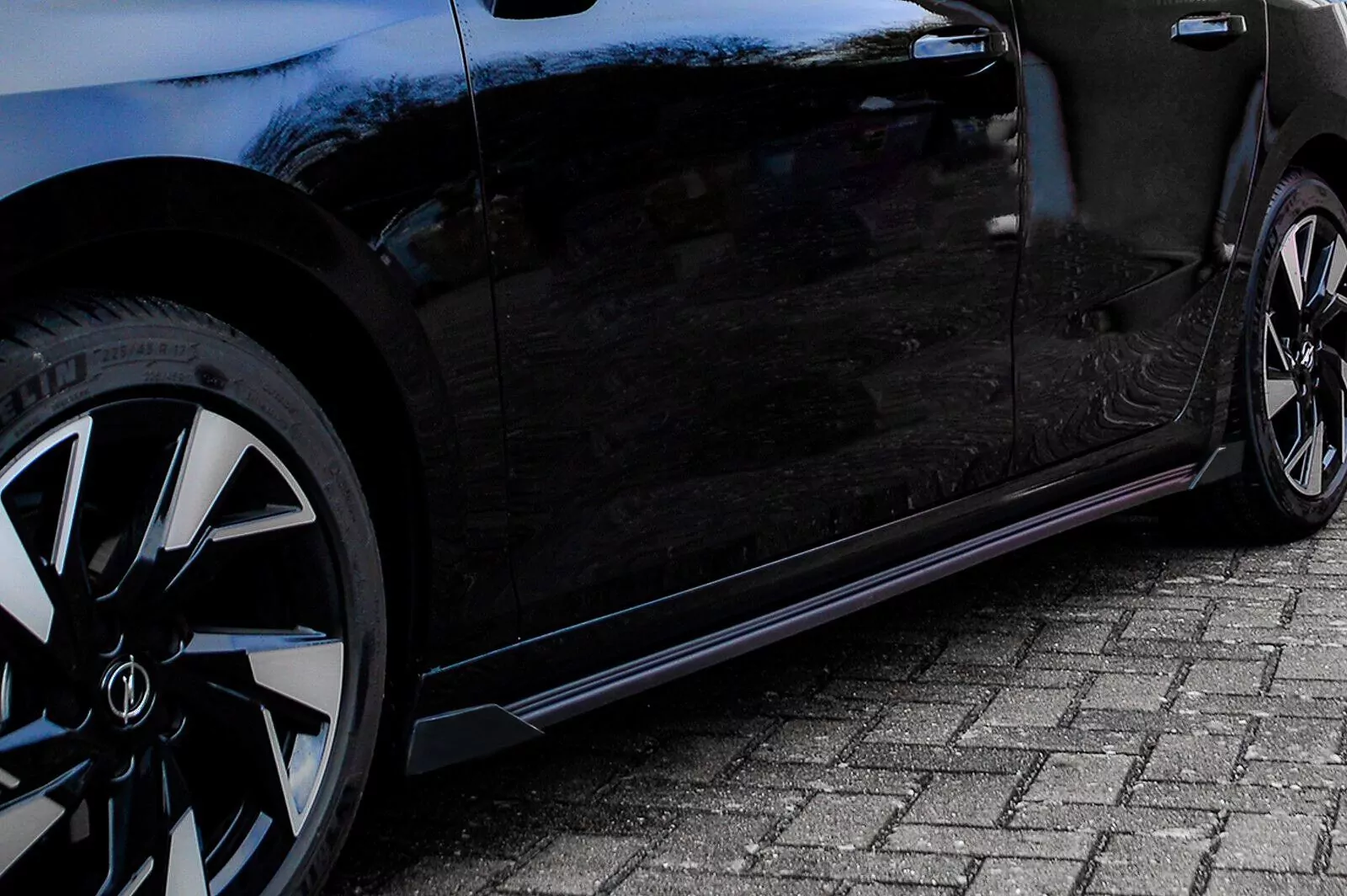 CUP Seitenschweller aus ABS mit Wing vorn + hinten für Opel Astra L