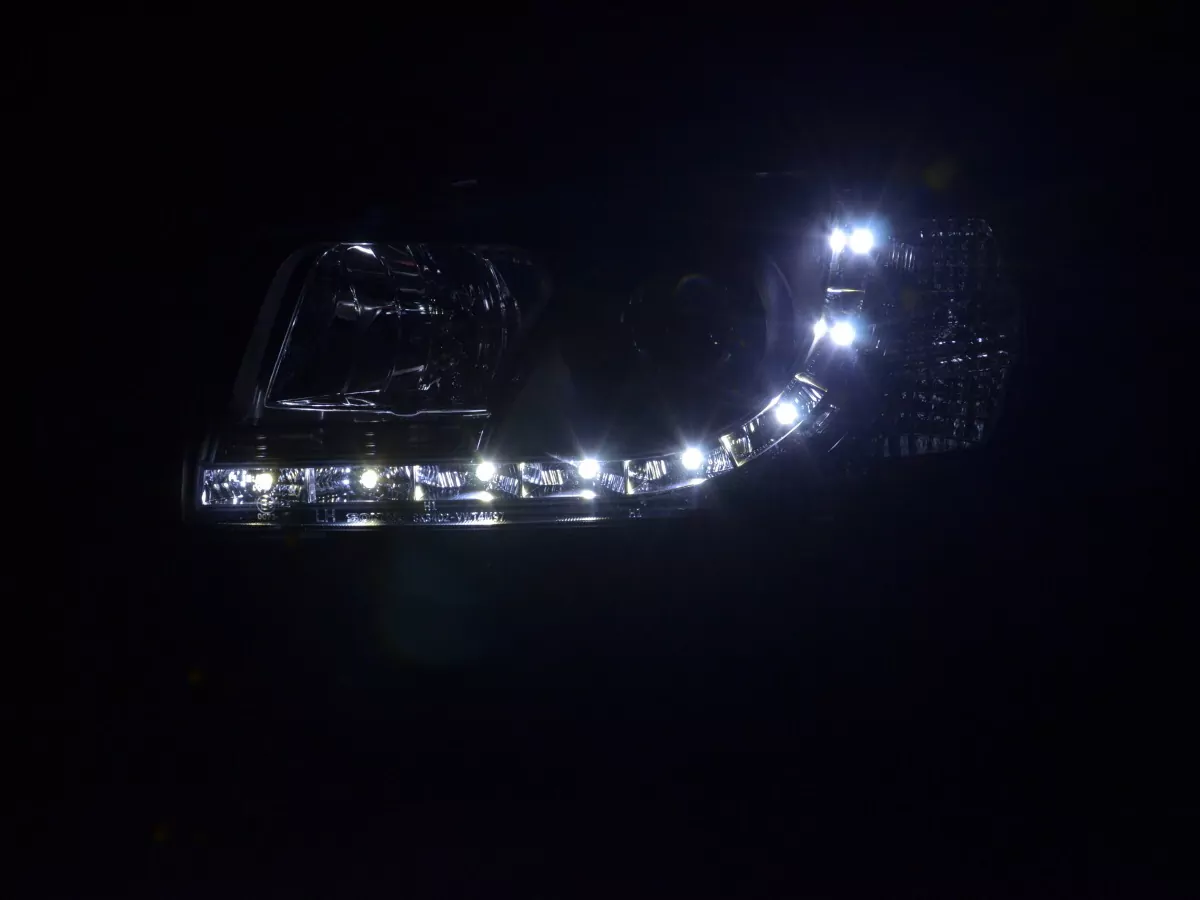 Scheinwerfer Set Daylight LED TFL-Optik VW Bus Typ T4 Bj. 96-03 schwarz für Rechtslenker