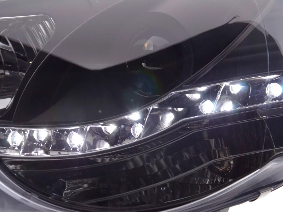 Scheinwerfer Set Daylight LED TFL-Optik VW Polo Typ 9N3 Bj. 05-09 schwarz