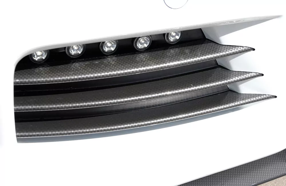 Hella Tagfahrleuchtensatz mit Pos.-Licht-Funktion für Opel Astra H Twin-Top