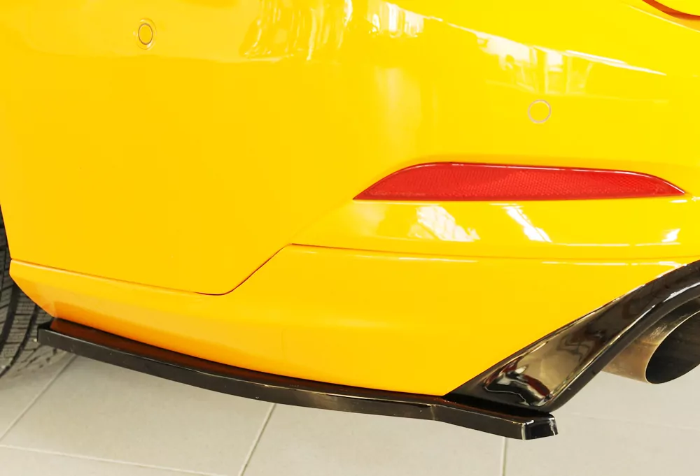 Rieger Heckschürzenansatz seitlich links matt schwarz für Ford Focus 4 ST (DEH) 5-tür. (Turnier) 04.22- (ab Facelift)