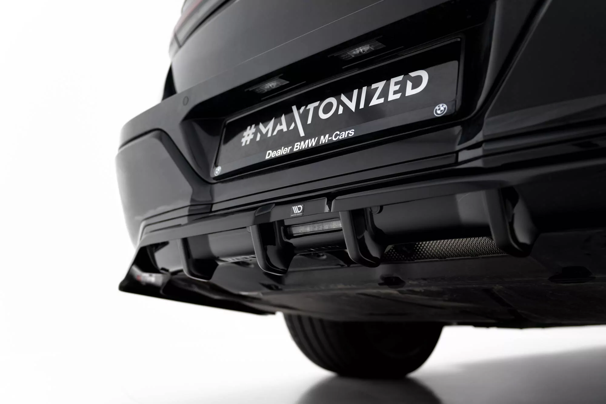 Hinten Splitter (mit Einem Vertikalem Balken) BMW 7 M-Paket G70 Schwarz Hochglanz