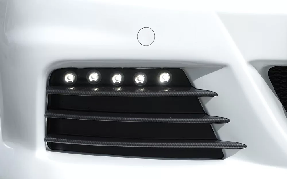 Hella Tagfahrleuchtensatz mit Pos.-Licht-Funktion für Opel Astra H Twin-Top